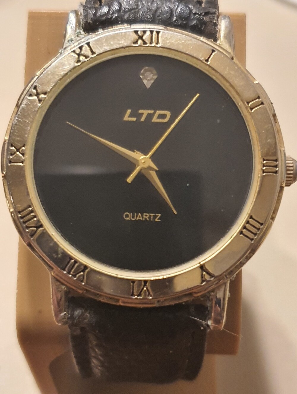 10/$20 LTD Goldtone/Black Diamond Leather Men's Watch